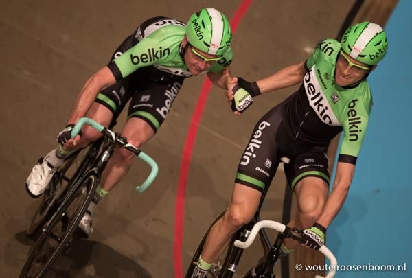 Belkin's Graeme Brown and Theo Bos make an exchange