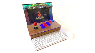 The best Glowforge machines; a photo of a retro arcade cabinet made using a laser cutter