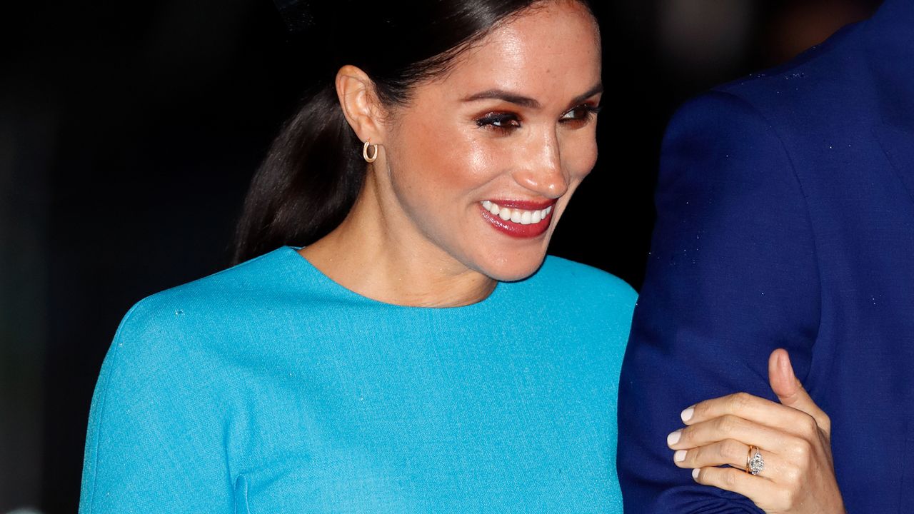 Meghan Markle wearing off white nails for a public appearance