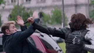The Winter Soldier and Steve fighting.