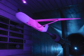 With a coat of pressure-sensitive fluorescent paint, the hot-pink hue of an aircraft in testing helps engineers at NASA's Ames Research Center in California design new planes that run on half the fuel and produce only one-eighth the noise pollution.