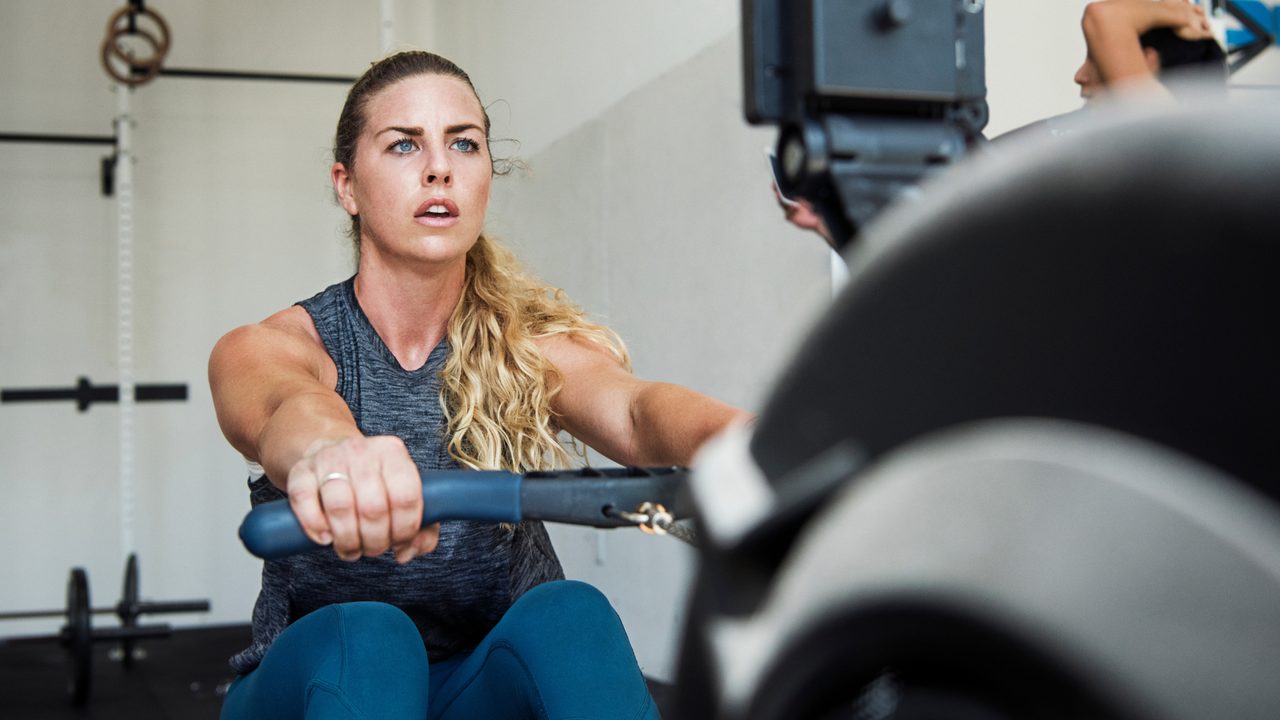 Woman on rowing machine