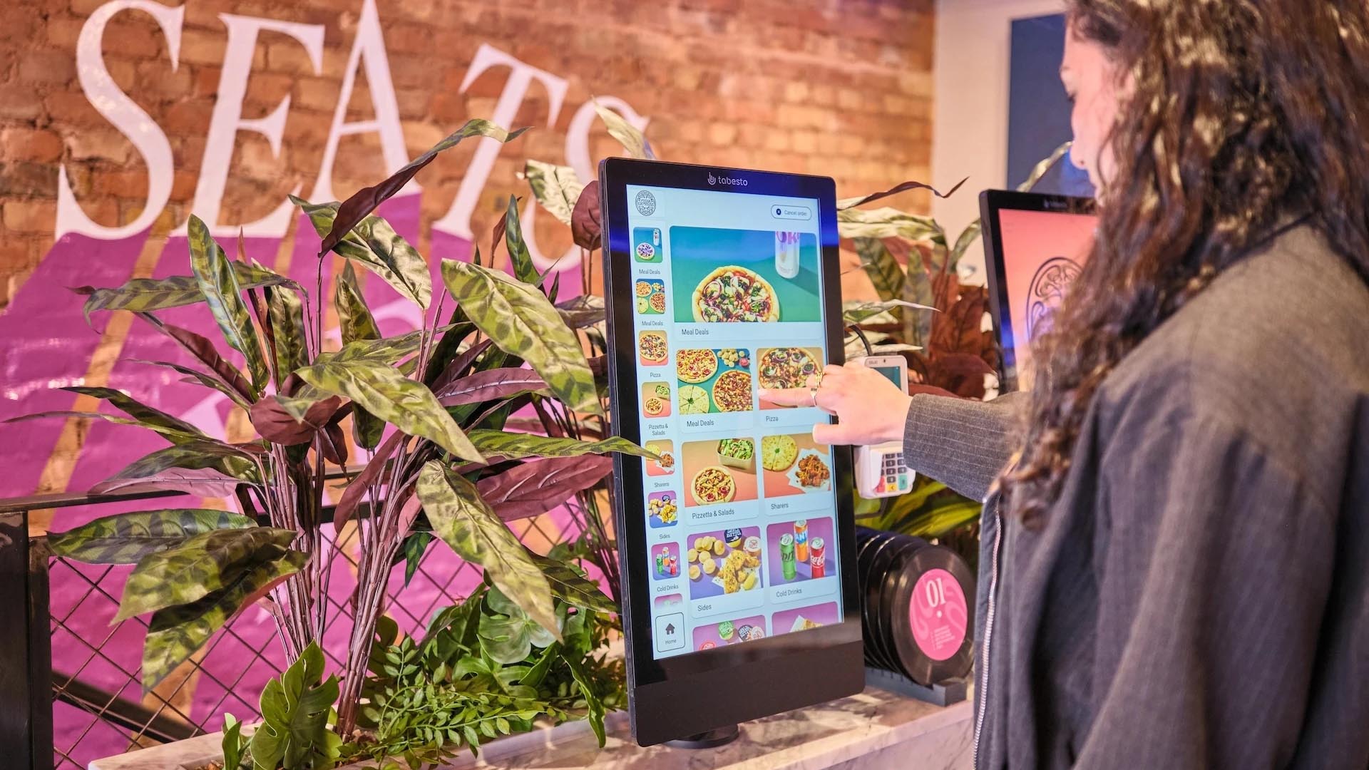 A photo of a PizzaExpress order terminal. 