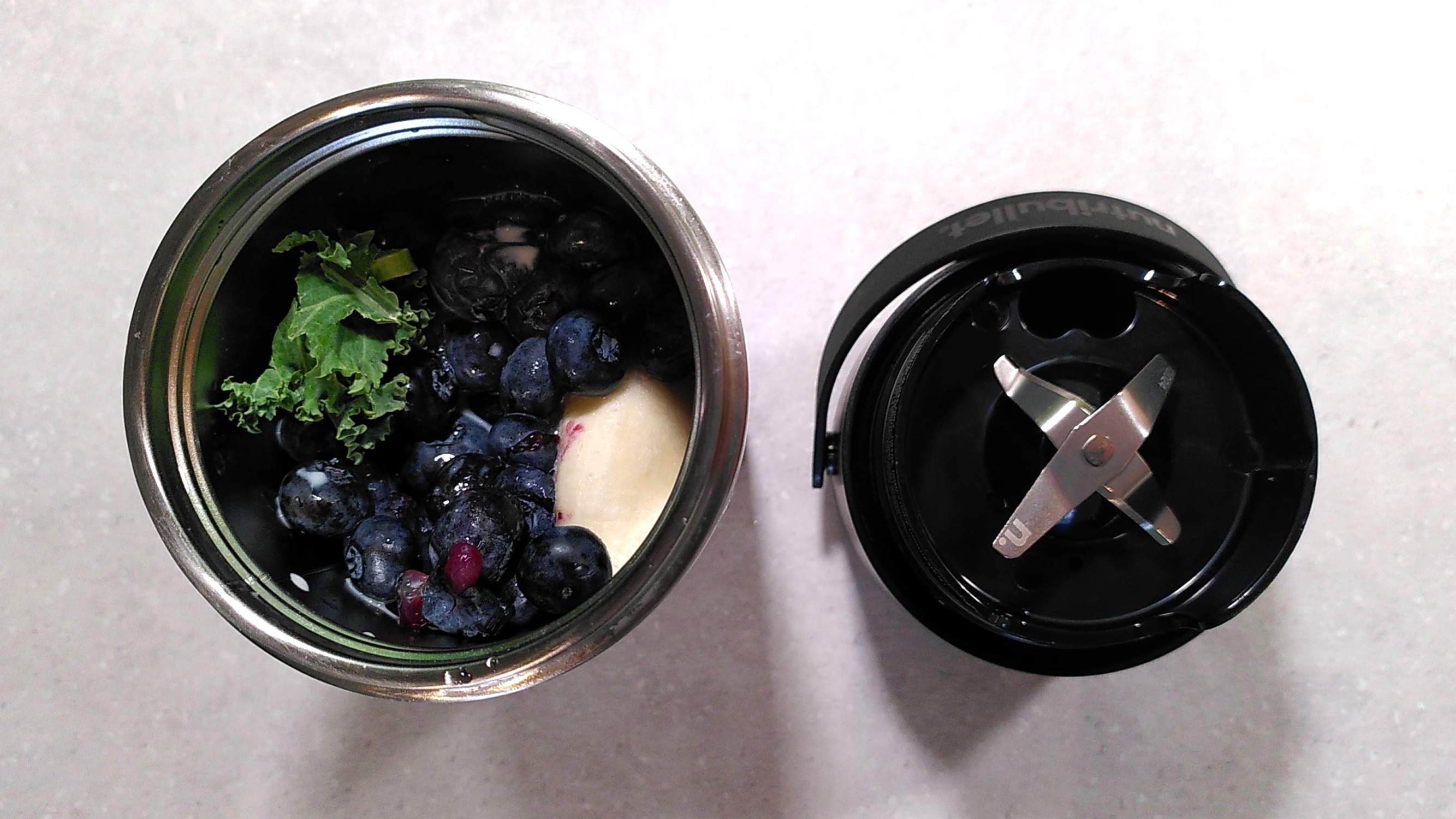 Top-down view of Nutribullet Flip blender full of smoothie ingredients