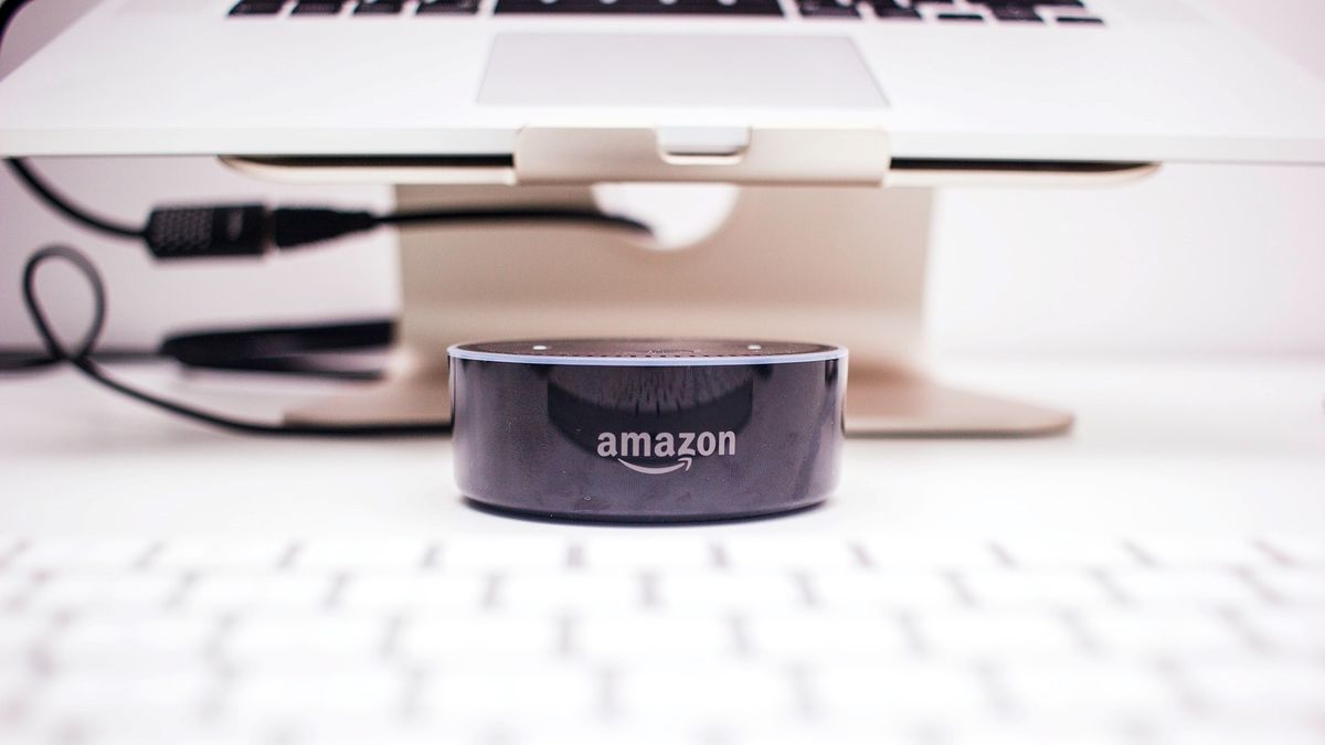 Photo of Amazon echo dot with Alexa by Piotr Cichosz on Unsplash