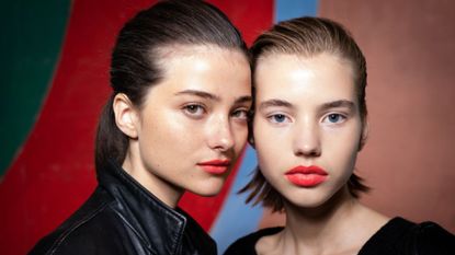 two models posing - straight eyebrow trend