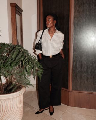 Fashion influencer @nlmarilyn wearing an elegant, on-trend outfit that taps into the "quiet luxury" aesthetic.