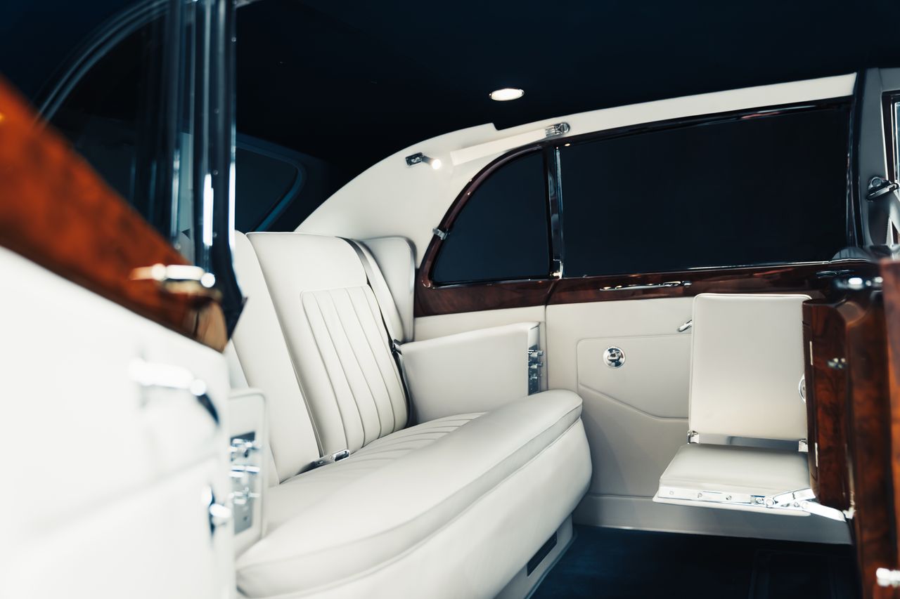 The rear seats of the phantom V, appointed in white leather