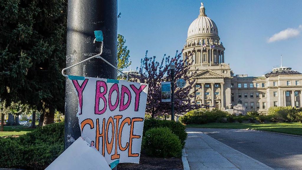 A sign taped to a hanger hangs near the Idaho Capitol in Boise after protests against the state&#039;s new abortion laws