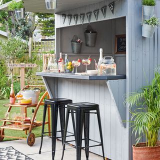 outdoor area with black metal stool