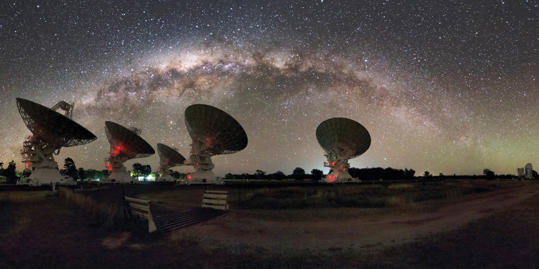 Astronomers used the CSIRO Compact Array in Australia, shown here with the Milky Way overhead, to detect strange plasma lenses shaped like noodles in the space between the stars of our galaxy.