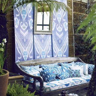 garden pattern with art wall and drapped fabrics