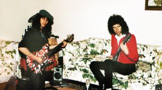 Eddie Van Halen (left) and Brian May hold their guitars in the studio in 1983