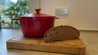 Tefal Air Cast Aluminium Stewpot with a loaf of bread in front