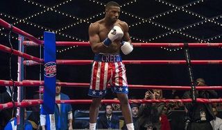 Creed II Adonis in the ring, gloves up