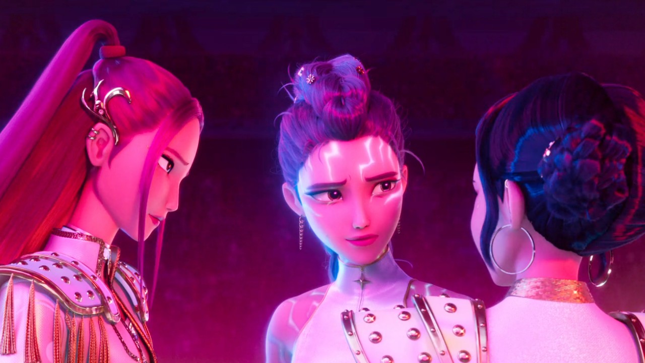 Rumi, Zoey, and Mira look at each other in KPop Demon Hunters.