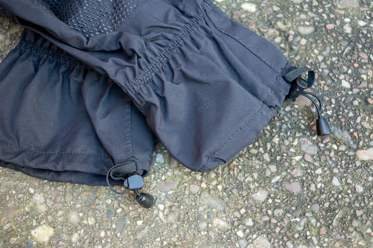 Black Sportful lobster gloves on some concrete