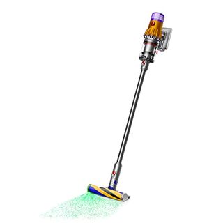 A long stick cordless vacuum with a yellow and purple main unit and a grey stick