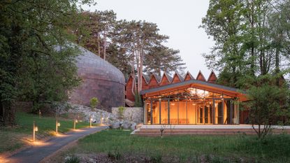 Evian concert hall, La Source Vive, all organic forms in the woods