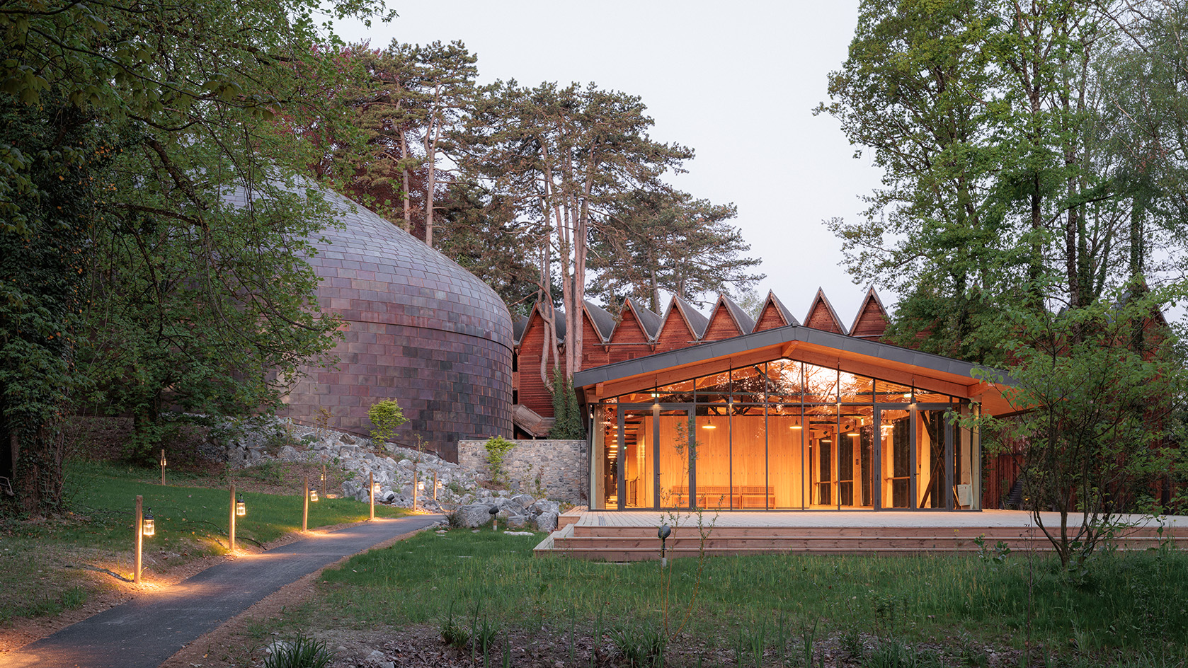Evian concert hall, La Source Vive, all organic forms in the woods
