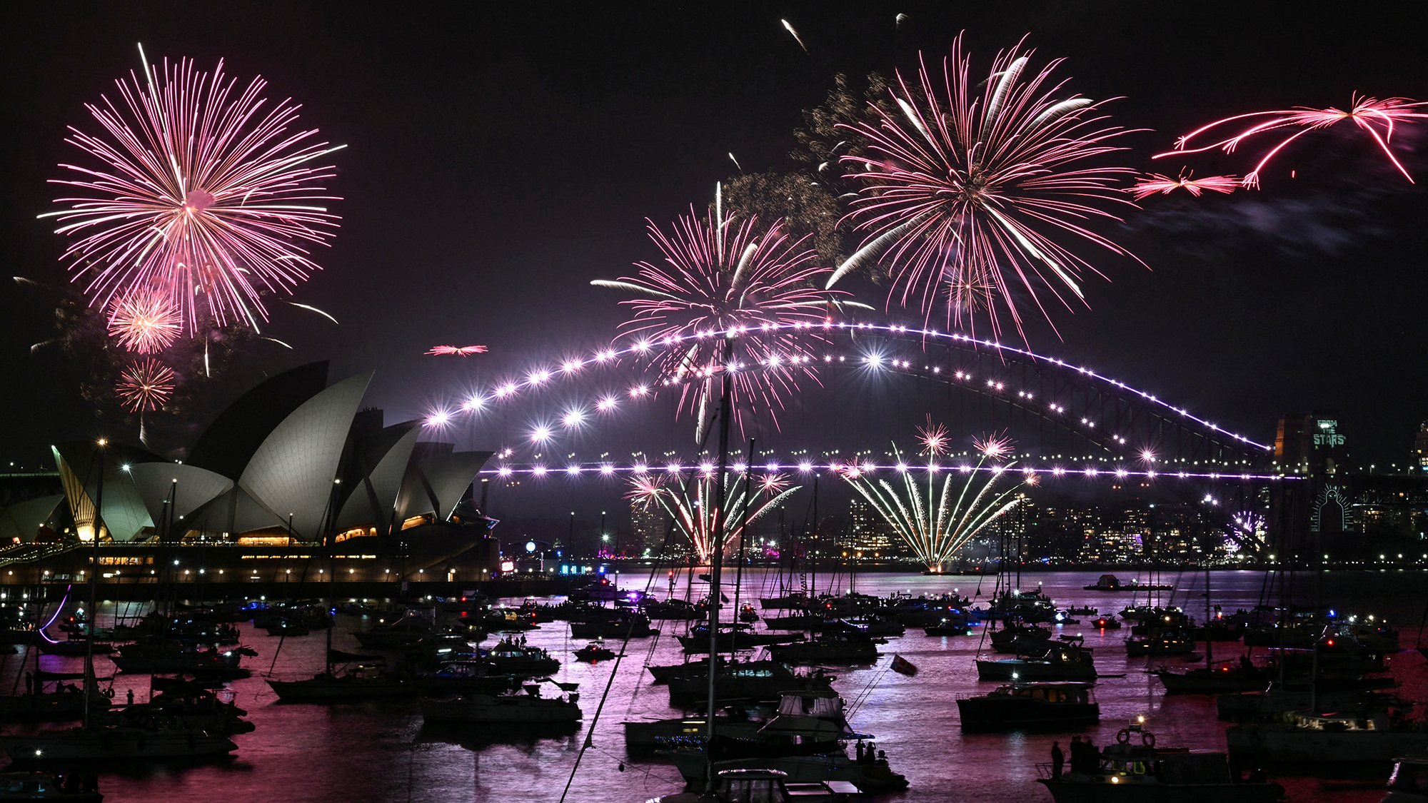 Fireworks light up the Opera House and Harbour Bridge during New Year's Eve celebrations in Sydney, Australia