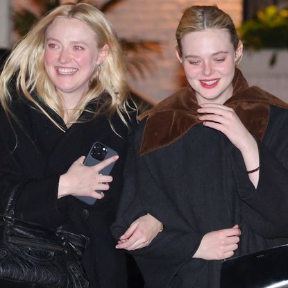 Elle and Dakota Fanning joined each other for a night out with different black It-bags