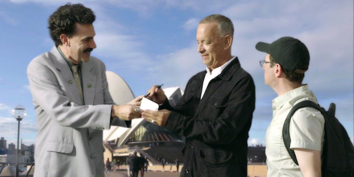 Sasha Baron Cohen, Tom Hanks and director Jason Woliner in Borat 2