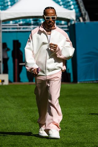 Lewis Hamilton of Great Britain and Mercedes arrives in the paddock prior to the F1 Grand Prix of Miami at Miami International Autodrome on May 5, 2024 in Miami, United States.