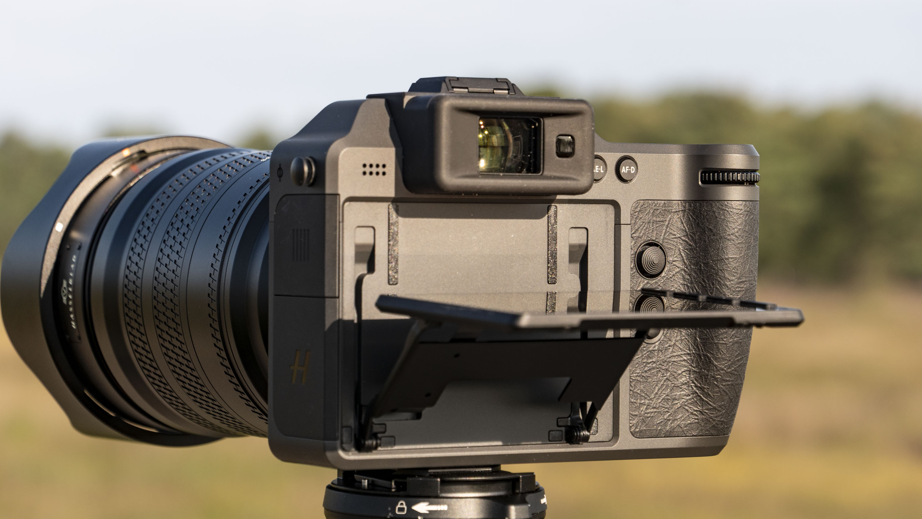 Hasselblad X2D II 100C camera outdoors at first light, with its screen tilted up