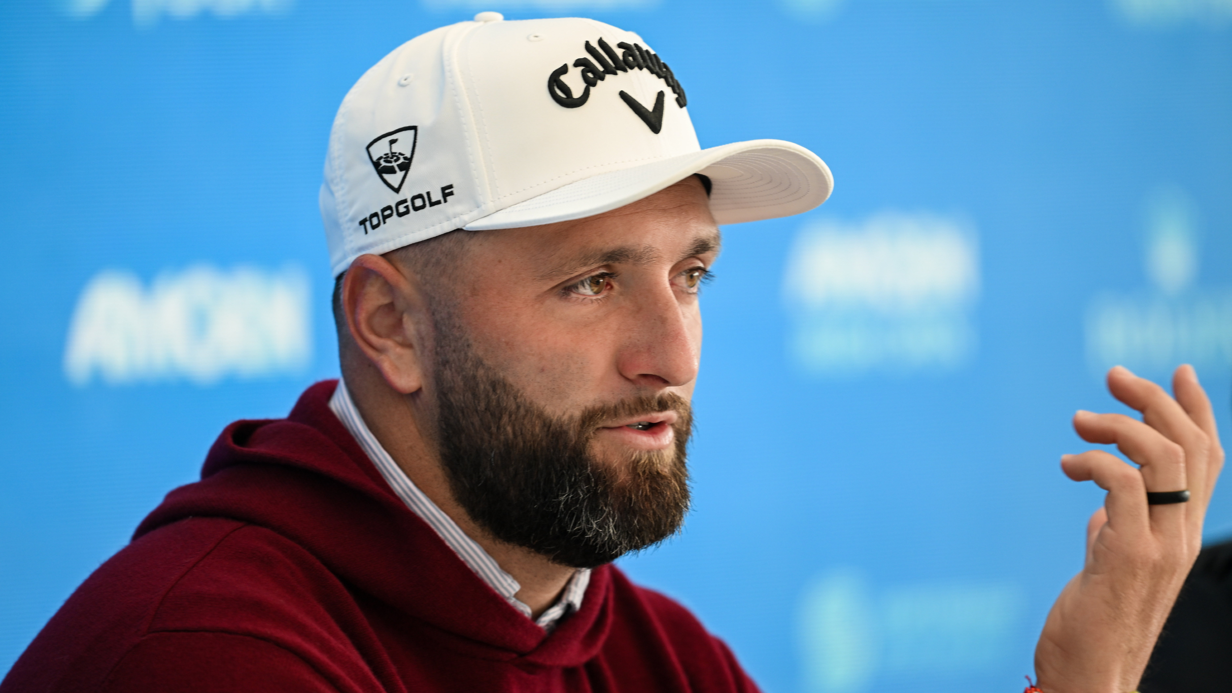 Jon Rahm talks to the press