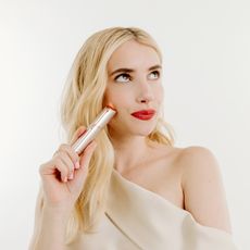 emma roberts holding hair removal device