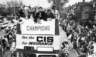 Liverpool players on a bus parade through the city following their European Cup final win over Club Brugge in May 1978.