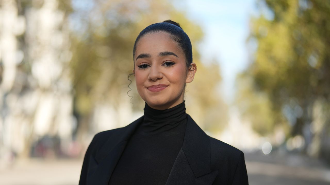 best eyebrow pencil - Lena Mahfouf wears a black turtleneck pullover, a long blazer jacket, outside Stella McCartney, during the Womenswear Spring/Summer 2024 as part of Paris Fashion Week on October 02, 2023 in Paris, France