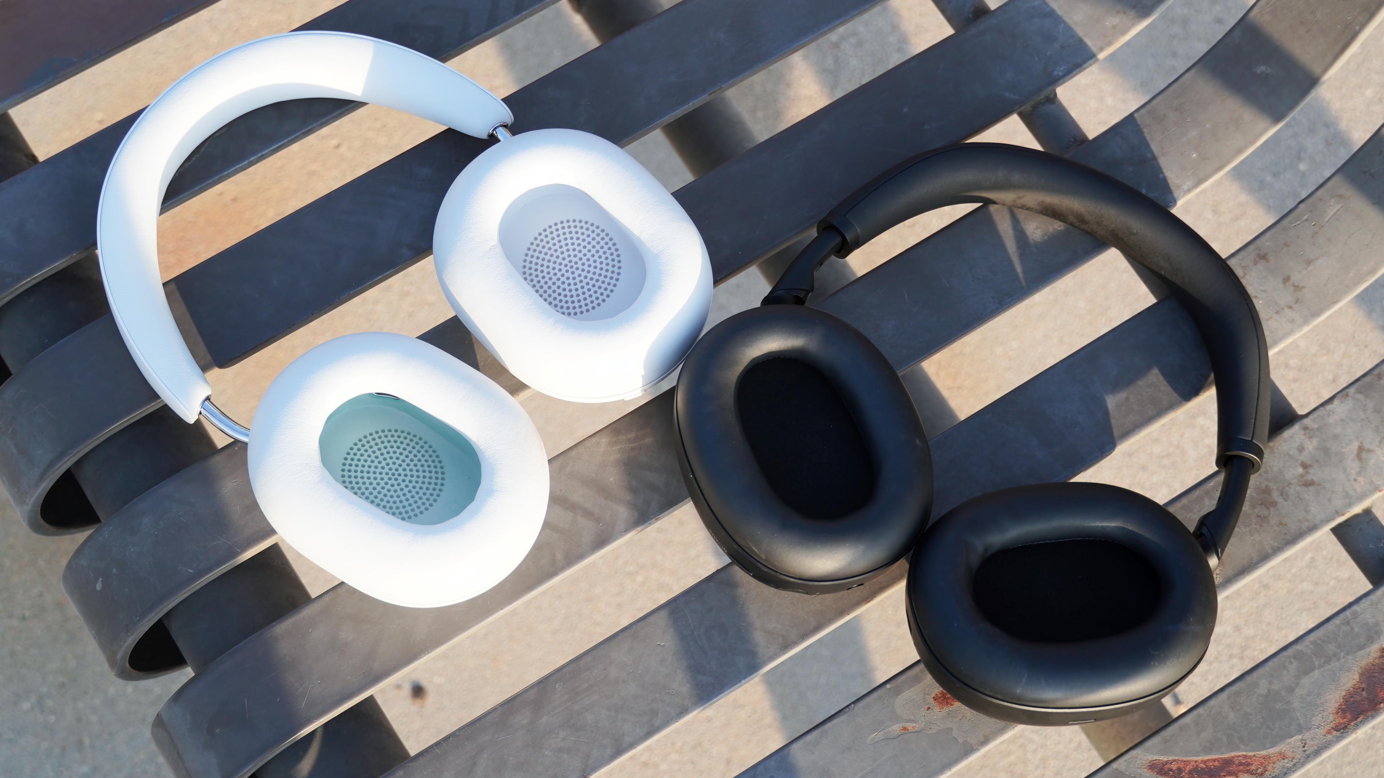 The Sonos Ace in white beside the Sony WH-1000XM6 in black.