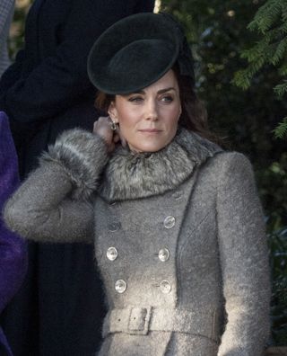 Kate Middleton in a gray Catherine Walker coat on Christmas Day 2019.