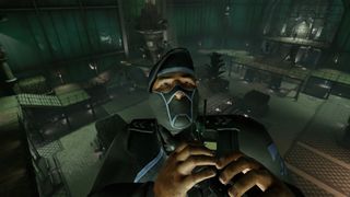 A still from Batman: Arkham Shadow showing Batman holding a foe in Predator mode.