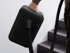 Compact black vacuum cleaner