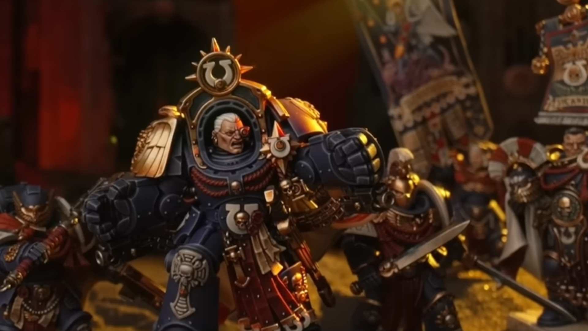 New Marneus Calgar miniature amongst Ultramarines models on a shadowed battlefield