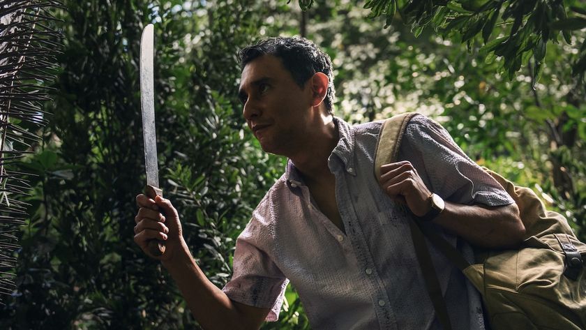 Manousos holding a machete walking through Duri&eacute;n Gap in Pluribus Episode 7
