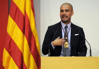 Barcelona coach Pep Guardiola gives a speech after receiving a gold medal from the Catalan parliament as part of the celebrations ahead of the National Day of Catalonia in September 2011.