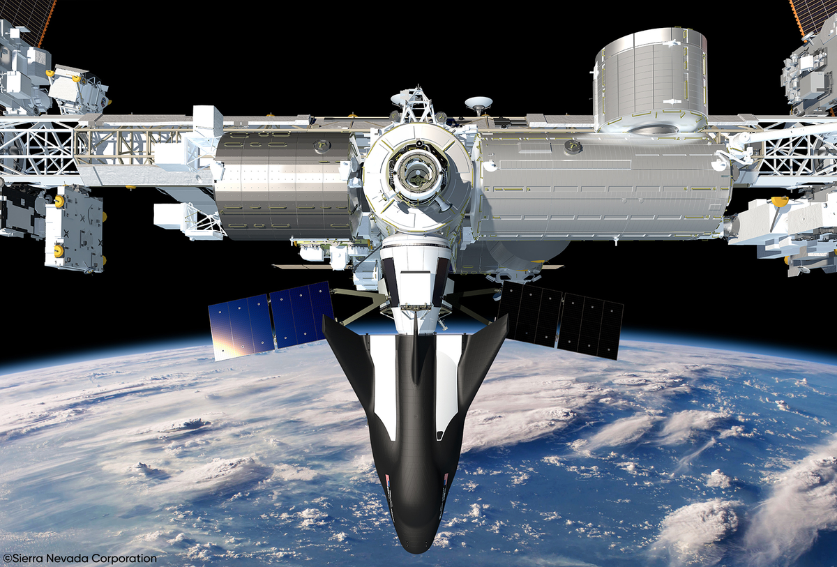 An artist's impression of the Dream Chaser spacecraft docked to the International Space Station.