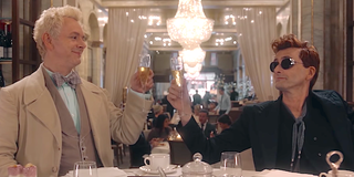 good omens aziraphale and crowley toasting at dinner