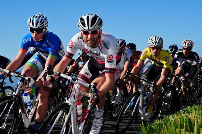 Vaughan Bowman (Target Trek) corners during the opening criterium in Rhyll