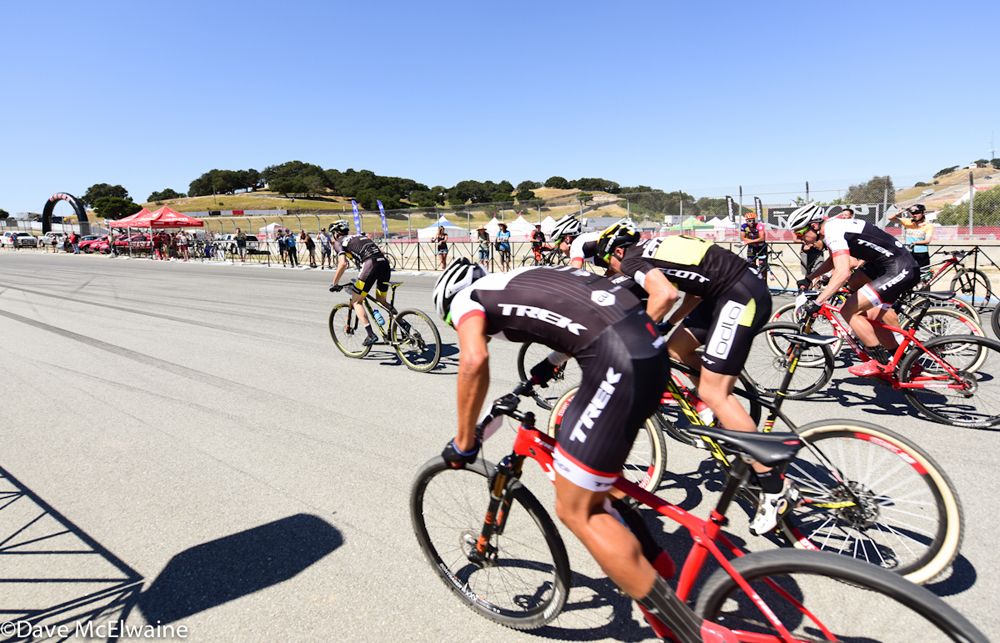 Riders at the start head out onto Laguna Seca Raceway
