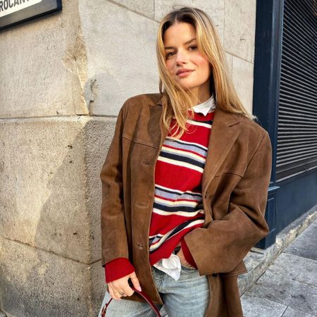 @sabinasocol wearing a striped top with blonde, tousled hair