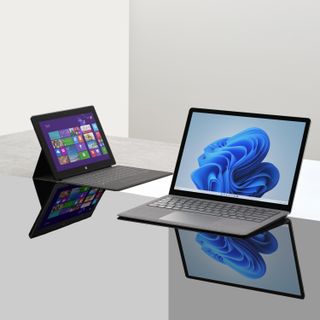 Microsoft Surface laptops on desk