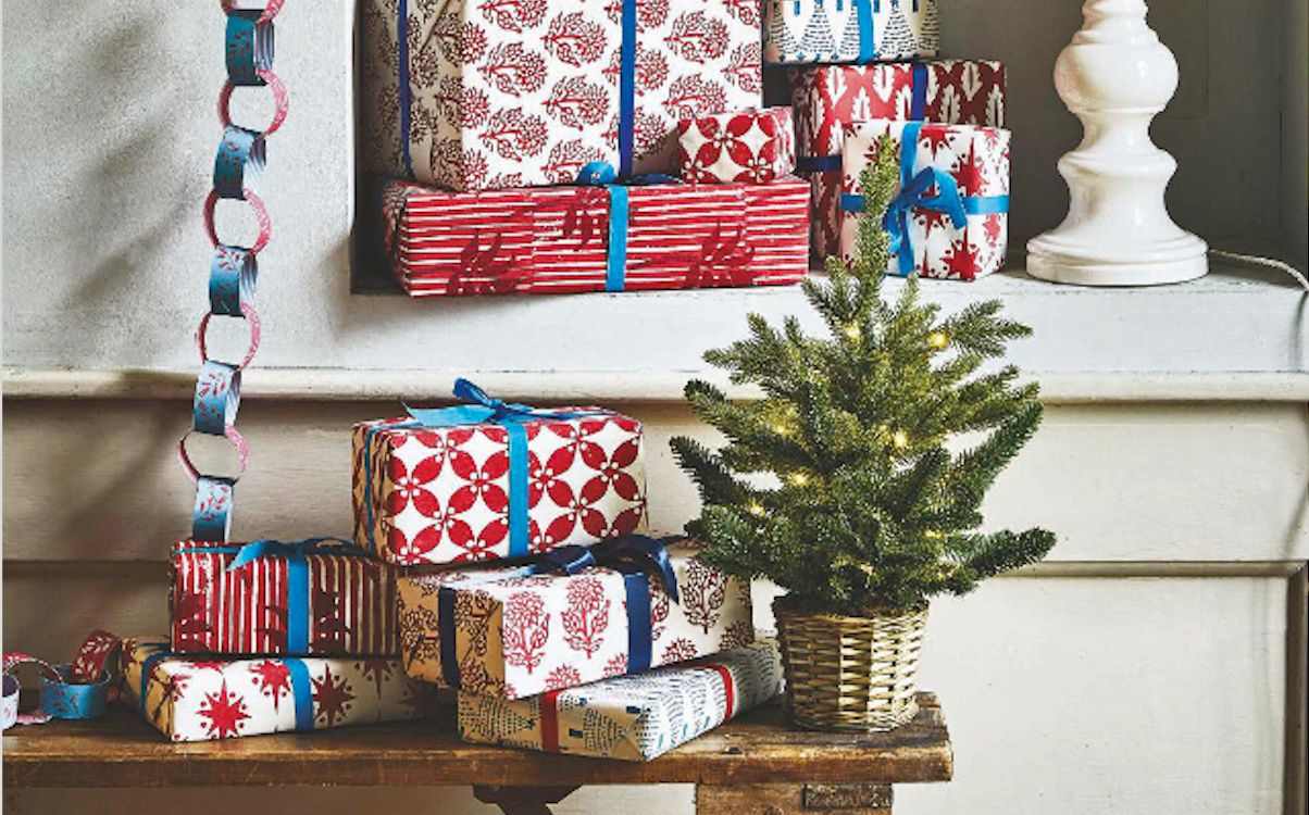 Christmas presents and mini tree taken from December issue of Homes &amp; Gardens magazine