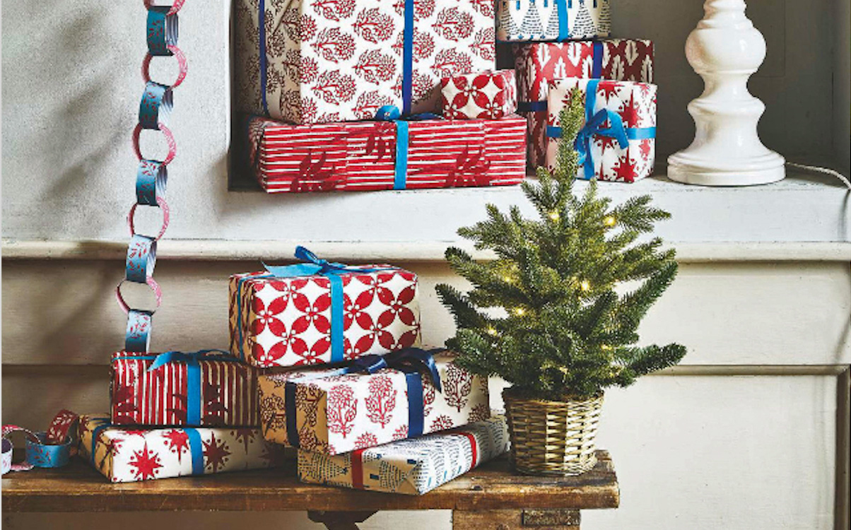 Christmas presents and mini tree taken from December issue of Homes & Gardens magazine