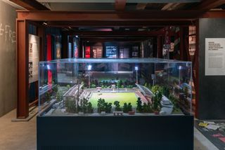 A glass showcasing a miniature version of the stadium at The FC St. Pauli Museum in Hamburg.