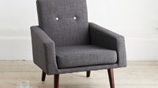 grey colour sofa with white background